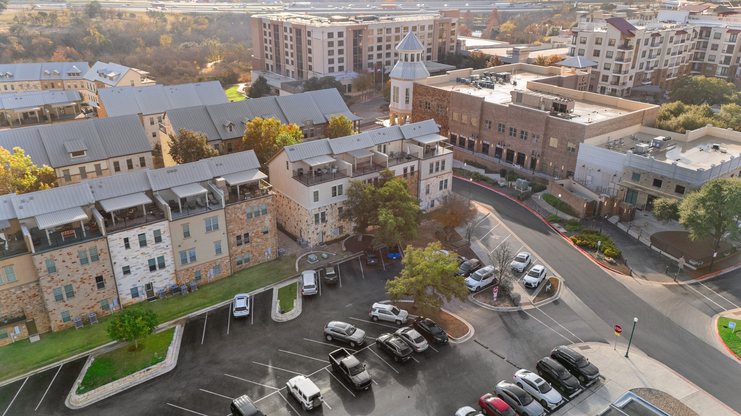 Aerial photograph of an apartment community showing site layout and amenities