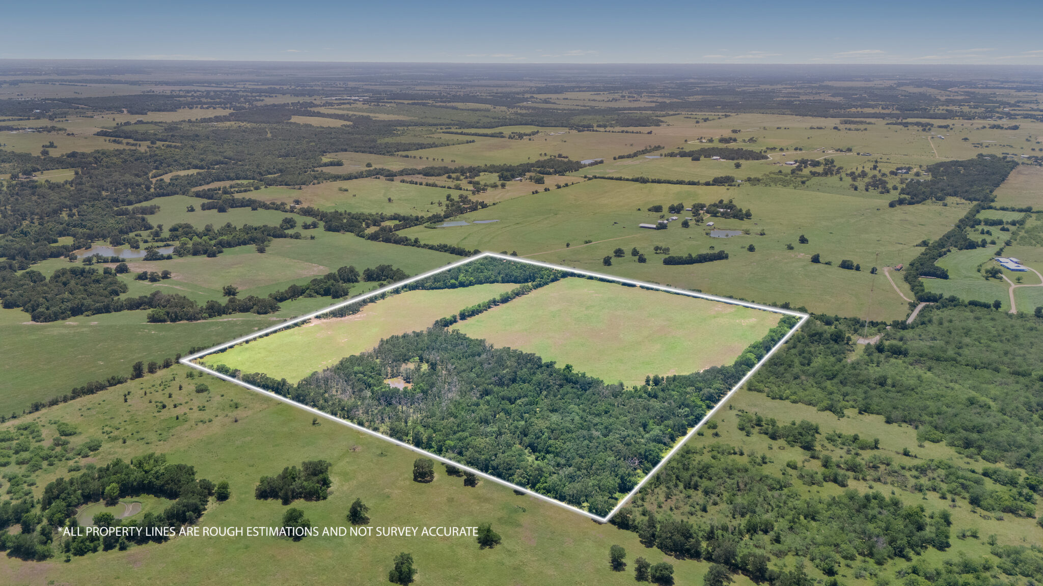 Drone photograph of rural Texas acreage with highlighted property boundaries showing land for sale