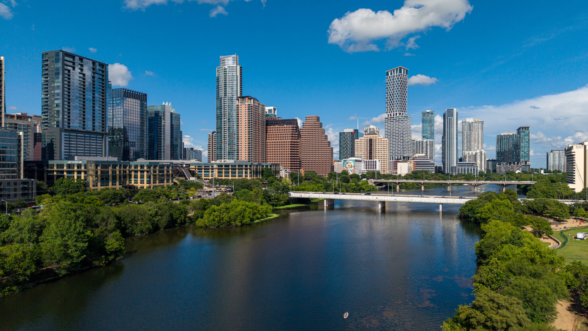 Aerial view of Austin's Town Lake skyline representing the ATXPhotoDude Central Texas service area