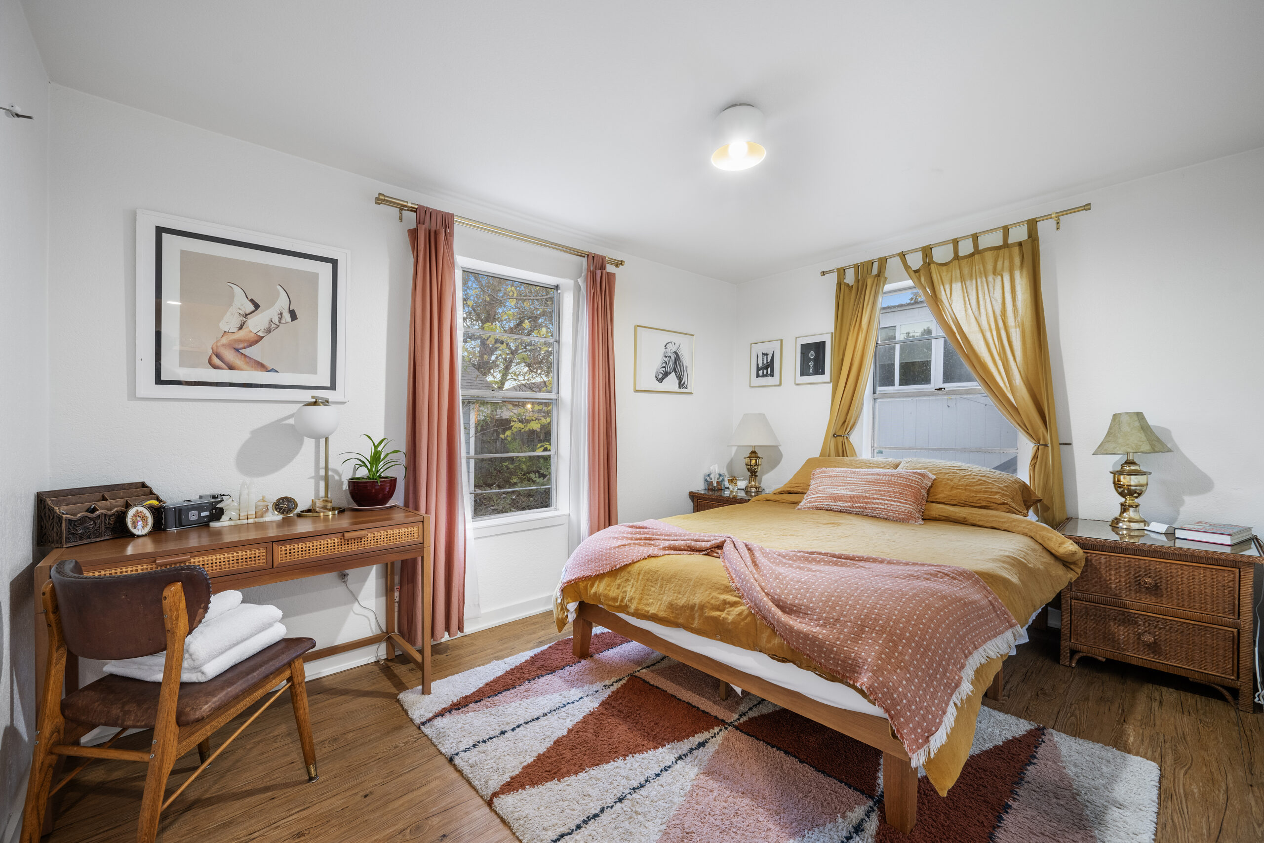 Primary bedroom in a beautifully designed Austin Airbnb photographed by ATXPhotoDude, a professional real estate photographer specializing in Airbnb and vacation rental photography.
