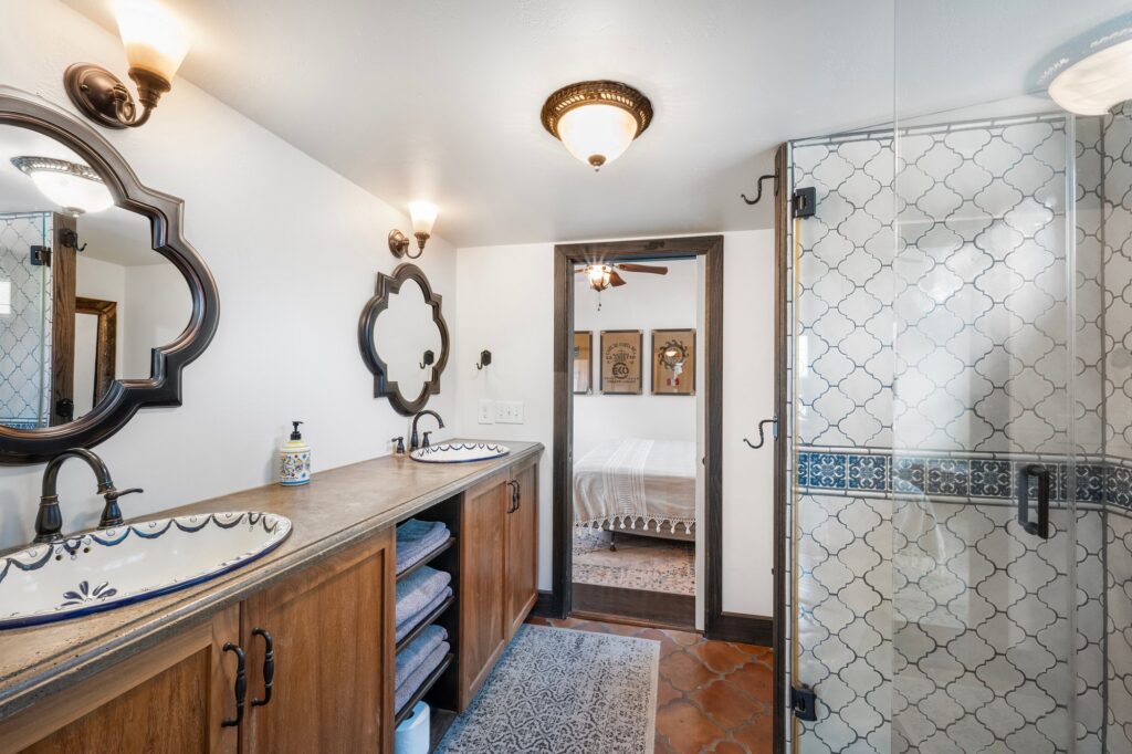 Austin real estate photography featuring a luxury bathroom with modern finishes, elegant fixtures, natural light, and professional interior photography.