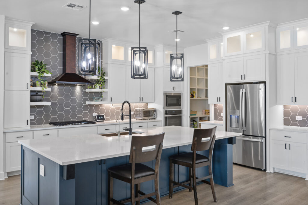 Luxury open-concept kitchen in a Central Texas home photographed by ATXPhotoDude, a professional real estate photographer specializing in luxury listing photography.