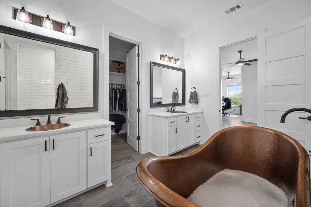 Luxury spa-inspired bathroom in a Central Texas home photographed by ATXPhotoDude, a professional real estate photographer specializing in luxury home photography.