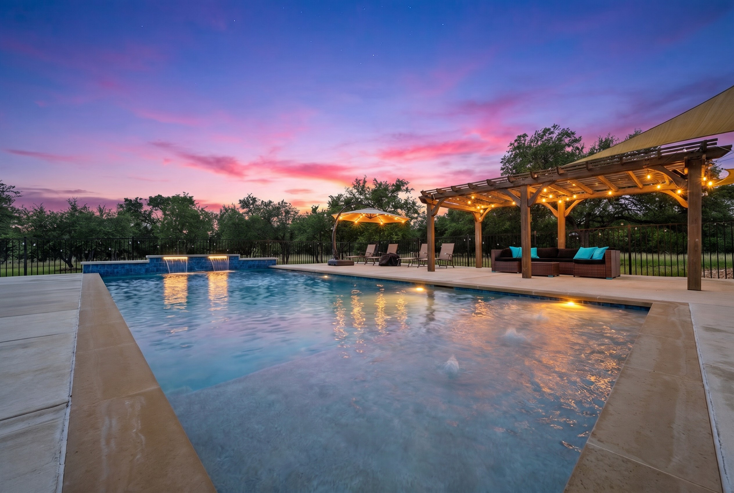 Luxury outdoor pool at twilight photographed by ATXPhotoDude, a professional real estate photographer specializing in luxury home and twilight photography across Central Texas.