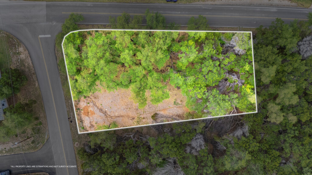 Lago Vista real estate photography featuring a drone aerial overview of a property with outlined lot boundaries overlooking the Texas Hill Country.