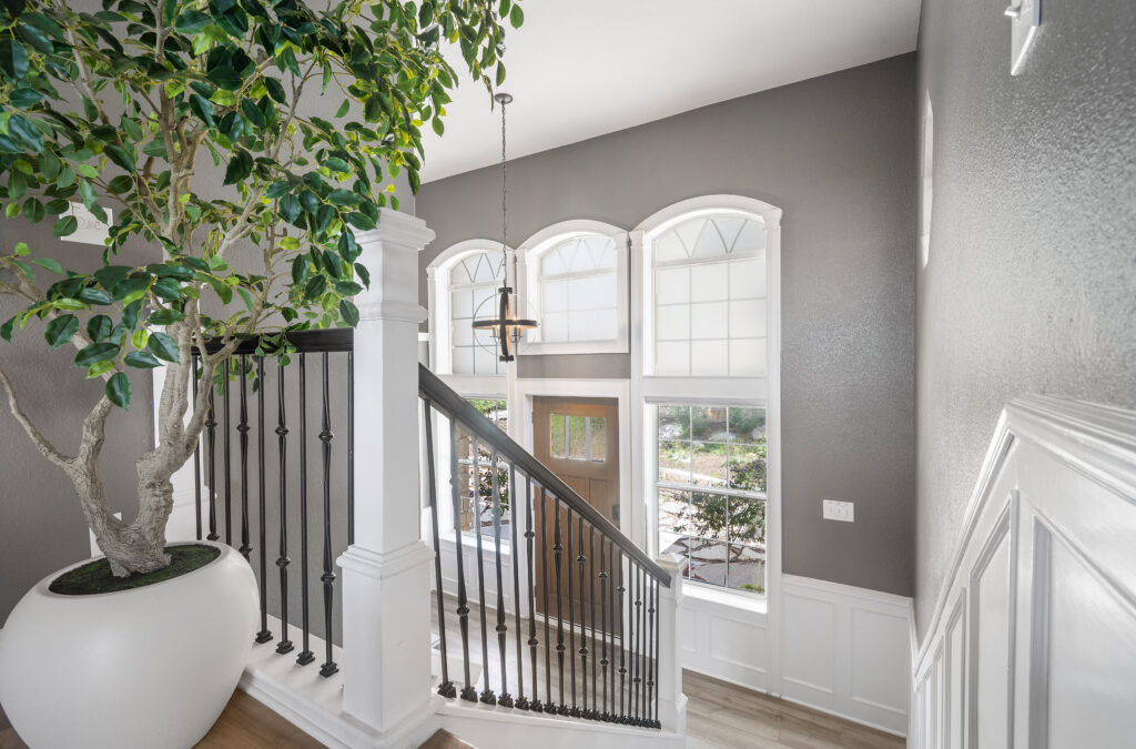 Lago Vista real estate photography featuring a welcoming home entry with elegant architectural details, natural light, and professionally captured interior photography.