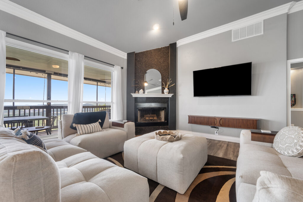 Lago Vista real estate photography featuring a bright luxury living room with expansive windows, open-concept design, and professionally captured interior photography.