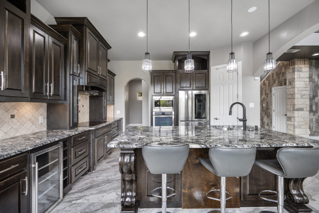 Luxury kitchen in a Lake Travis waterfront home photographed by ATXPhotoDude, a professional real estate photographer specializing in luxury home photography.