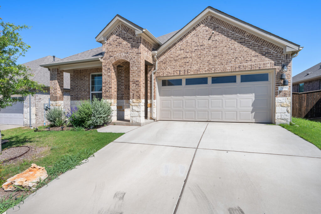 Luxury front exterior home real estate photography in Liberty Hill Texas