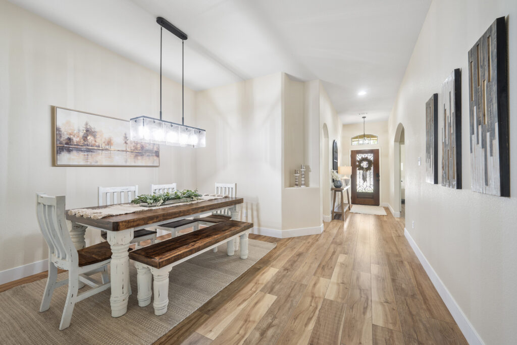 Formal dining room and entryway real estate photography in Liberty Hill Texas