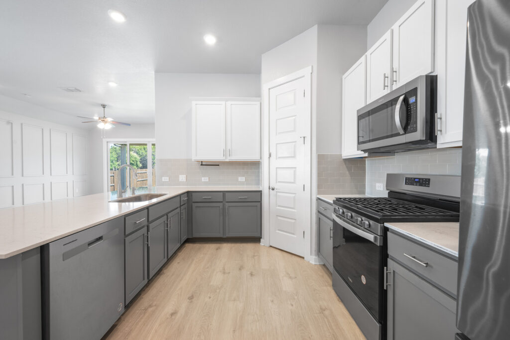 Luxury kitchen with granite countertops real estate photography in Liberty Hill Texas