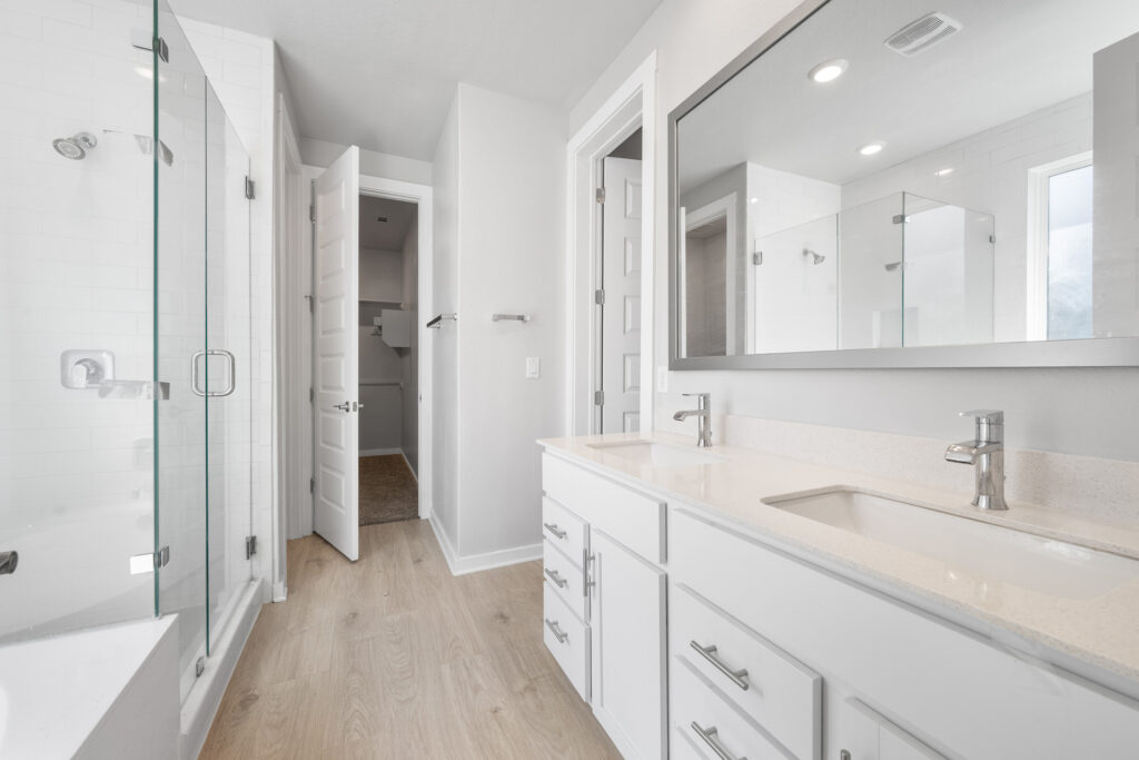 Luxury primary bathroom real estate photography in Liberty Hill Texas
