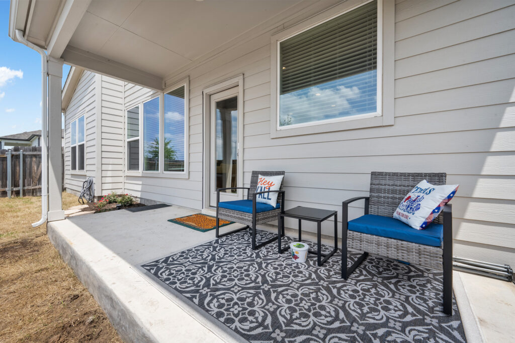 Rear exterior home real estate photography in Round Rock Texas