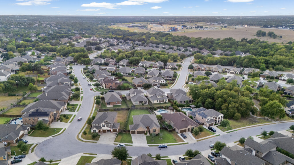 Aerial drone view of a Round Rock property photographed by ATXPhotoDude, a professional real estate photographer and FAA-certified drone pilot.