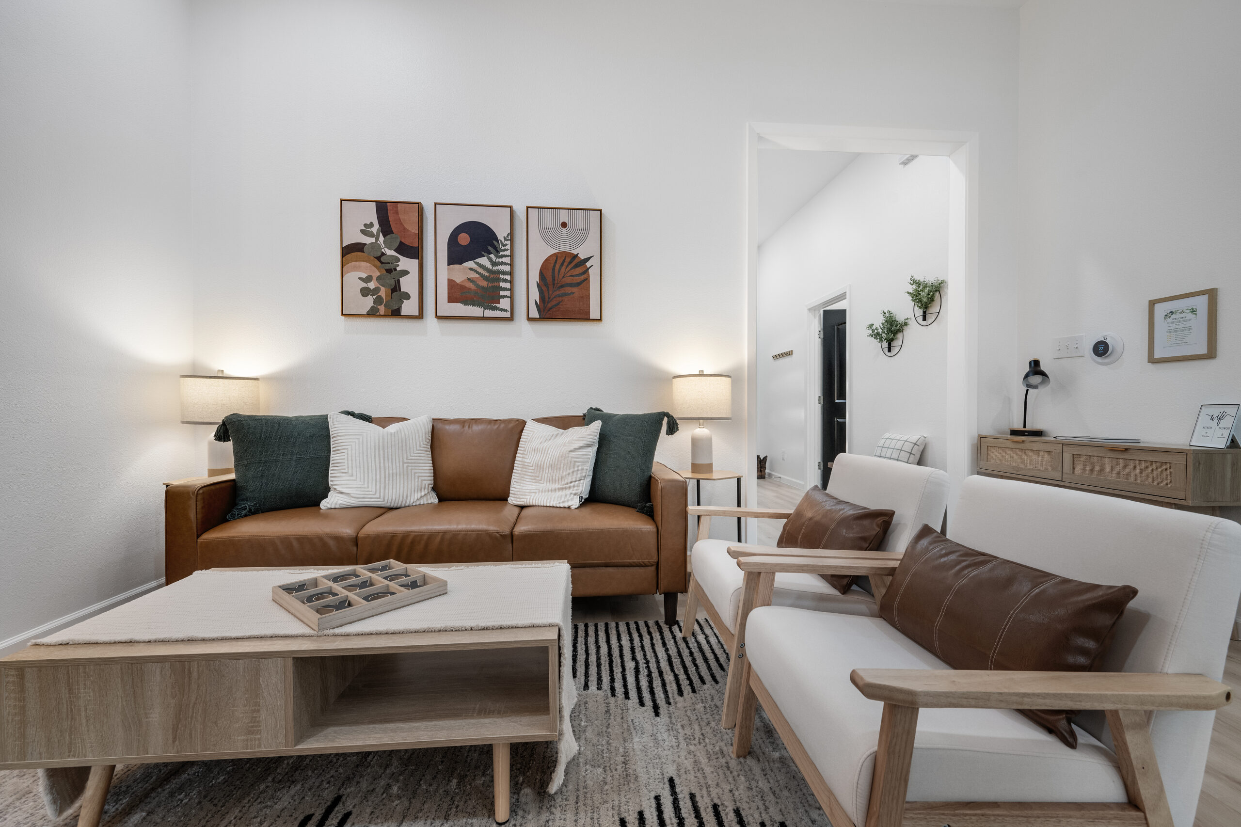 Inviting living room in an Austin Airbnb photographed by ATXPhotoDude, a professional real estate photographer specializing in Airbnb and vacation rental photography.